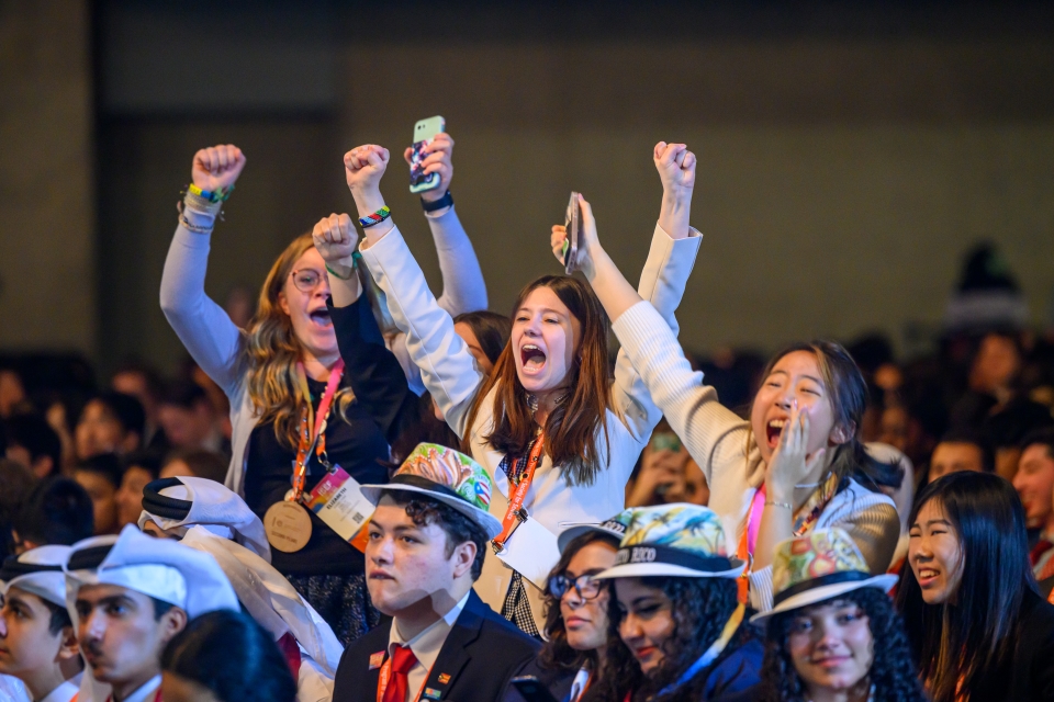 Finalists cheering at the Grand Awards Ceremony of the 2023 Regeneron International Science an Engineering Fair.